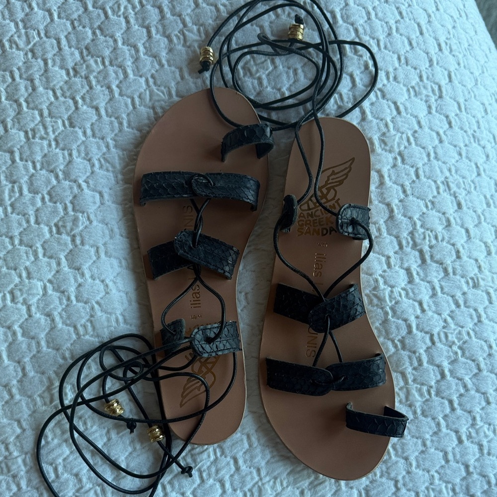 Ancient Greek Sandals Black Lace-Up Sandals with Gold Accents. Fits like a 37.